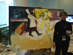 Pintora y cuadro con productos de alimentación