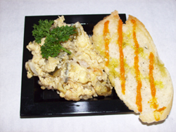 Tostada de zarangollo con aceite de tomate seco