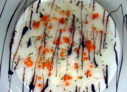 Carpaccio de cigala con huevas de trucha