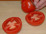 Tomates por la mitad