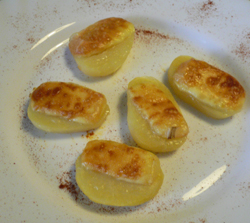 Patatas gratinadas con queso de oveja