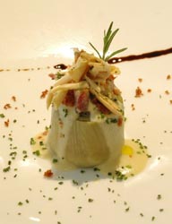 Corazón de alcachofa con bacalao al pilpil de manzanilla