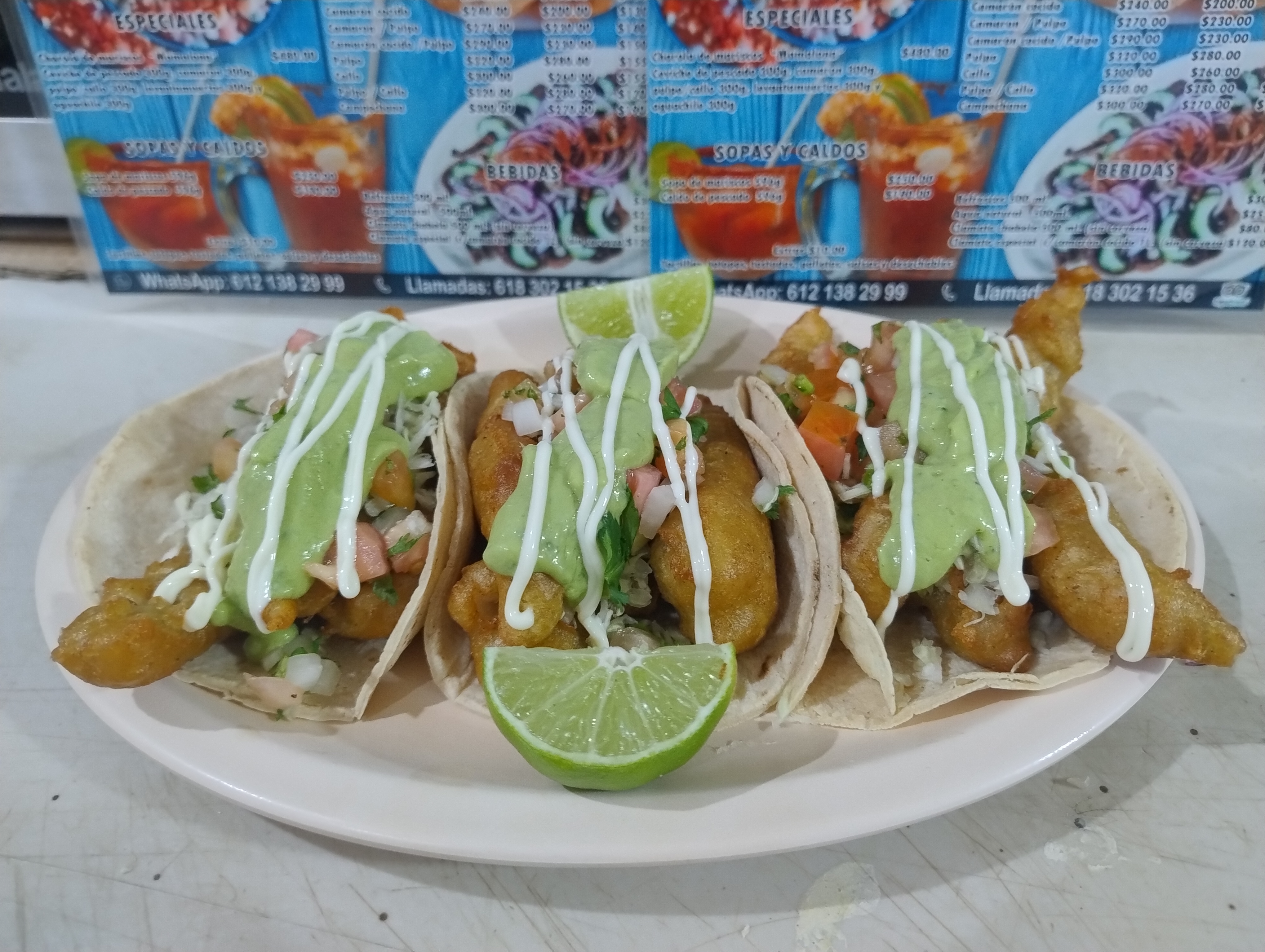 tacos de tacos y ceviche puerto ilusion mexico afuegolento